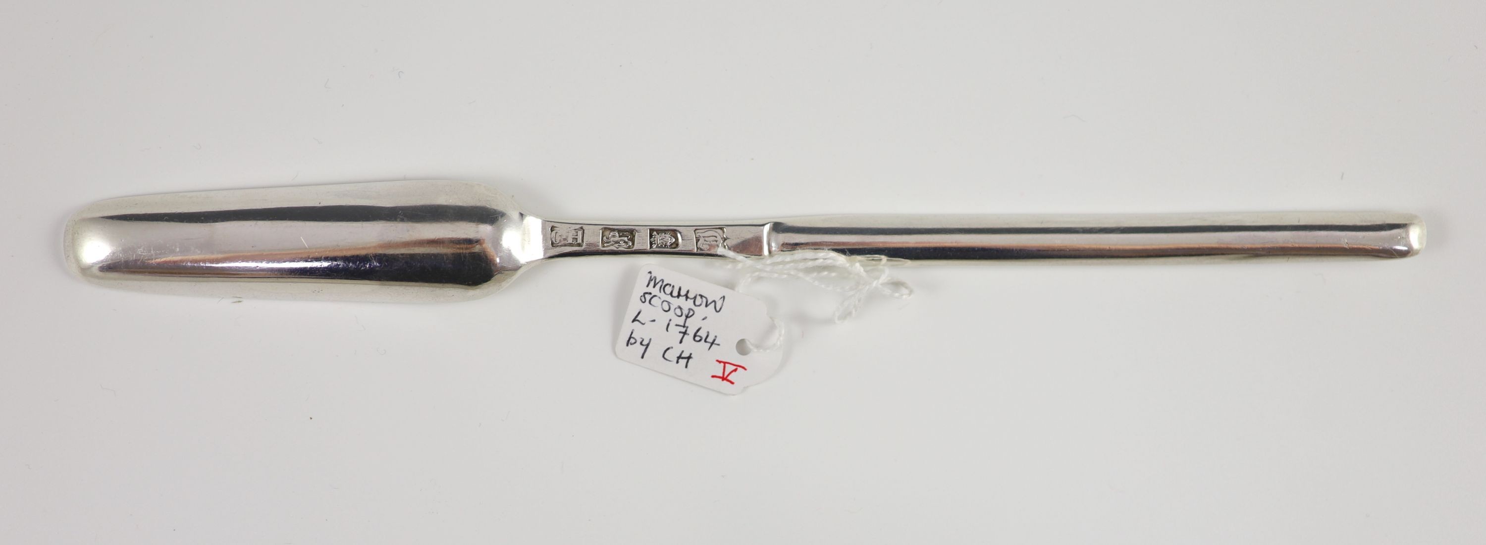 A George III silver marrow scoop, London, 1764, untraced (marked ‘C.H’) 24cm long, 1.7 oz.